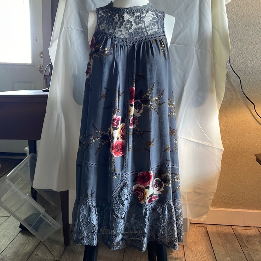 Bohemian dress by entro. Never worn. Size large, but fits like a medium.